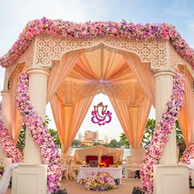 Grand layered lighting & reception stage decor for destination weddings by Pranaya Weddings
