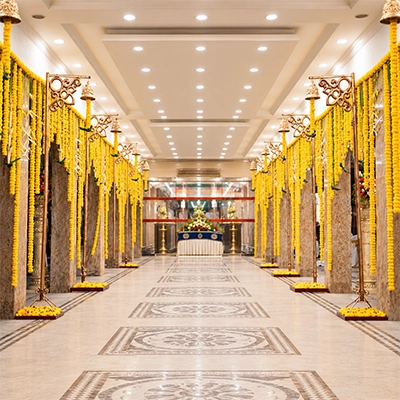 Vibrant flowers and decorations embellished the wedding stage, creating a romantic atmosphere.